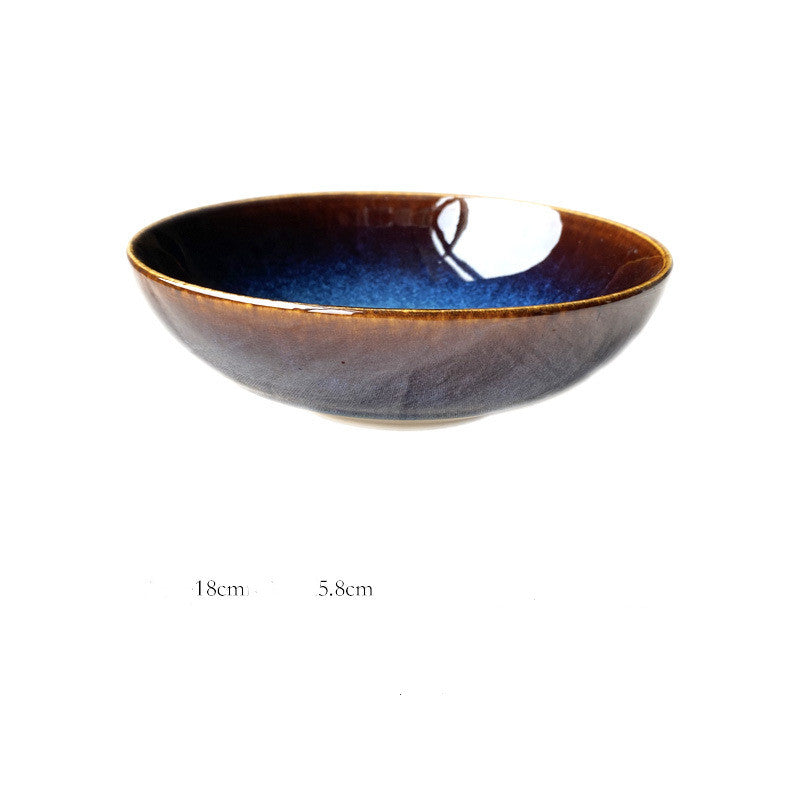 Blue kiln porcelain shallow bowl side view with size reference on white background
